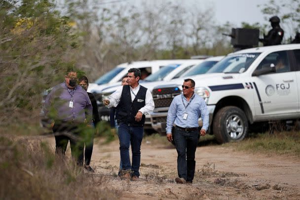 PHOTO: Tamaulipas attorney general's office personnel walk at the scene where authorities found the bodies of two of four Americans kidnapped by gunmen, in Matamoros, Mexico, March 7, 2023. (Daniel Becerril/Reuters)