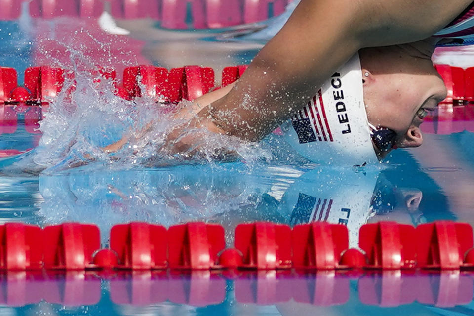 FILE - Katie Ledecky dives in to the pool at the start of the women's 1500-meter freestyle final at the TYR Pro Swim Series swim meet, April 11, 2021, in Mission Viejo, Calif. Ledecky started off the U.S. national championships Tuesday, June 27, 2023, with a dazzling performance in the 800-meter freestyle. She turned in her fastest time since setting the world record at the 2016 Rio Olympics. At 26, Ledecky has already sealed her legacy as one of the greatest freestyle swimmers the sport has ever witnessed, yet she shows no signs of slowing down. (AP Photo/Ashley Landis, File)