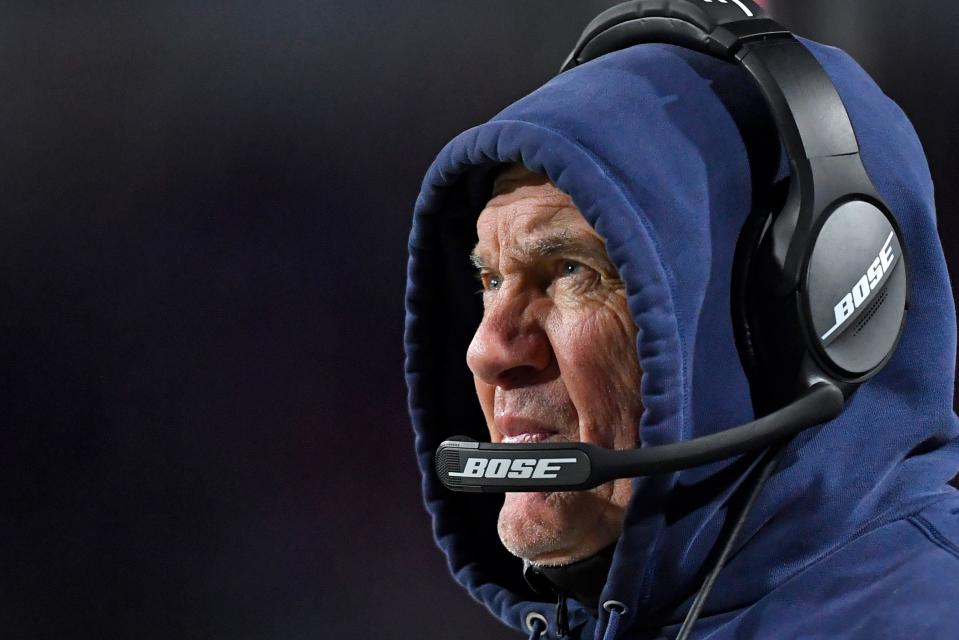 New England Patriots head coach Bill Belichick stands on the sideline during the first half of an NFL football game against the Buffalo Bills in Orchard Park, N.Y., Monday, Dec. 6, 2021. (AP Photo/Adrian Kraus)