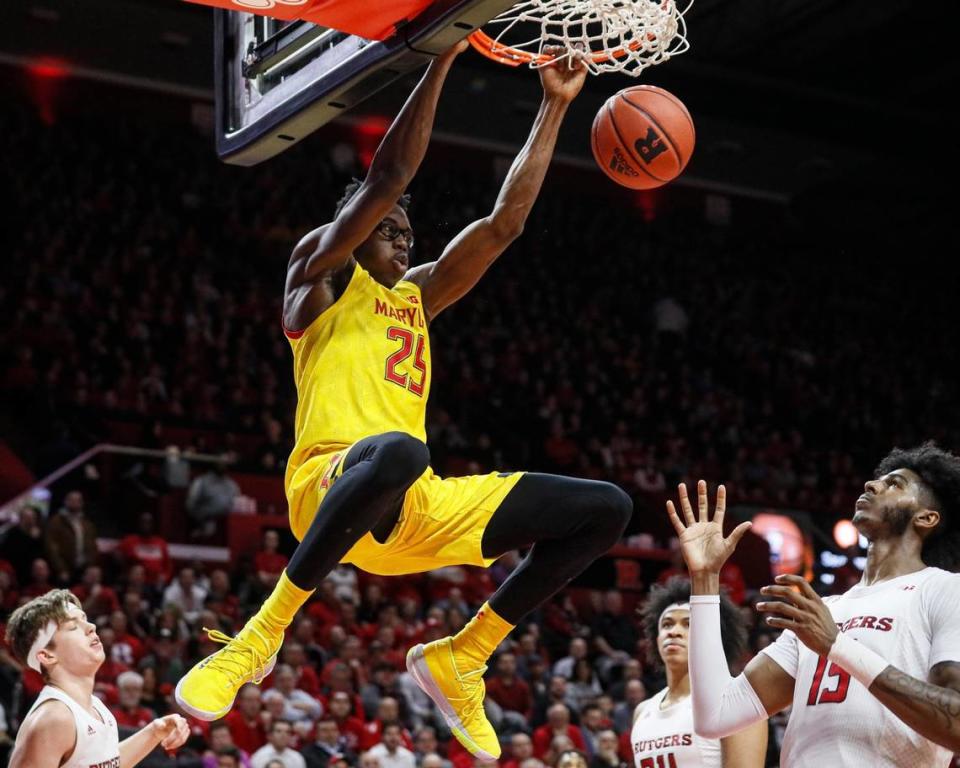 Maryland’s Jalen Smith (25) dunks as Rutgers’ Myles Johnson (15) watches during the first half of an NCAA college basketball game, in Piscataway, N.J., on March 3, 2020.