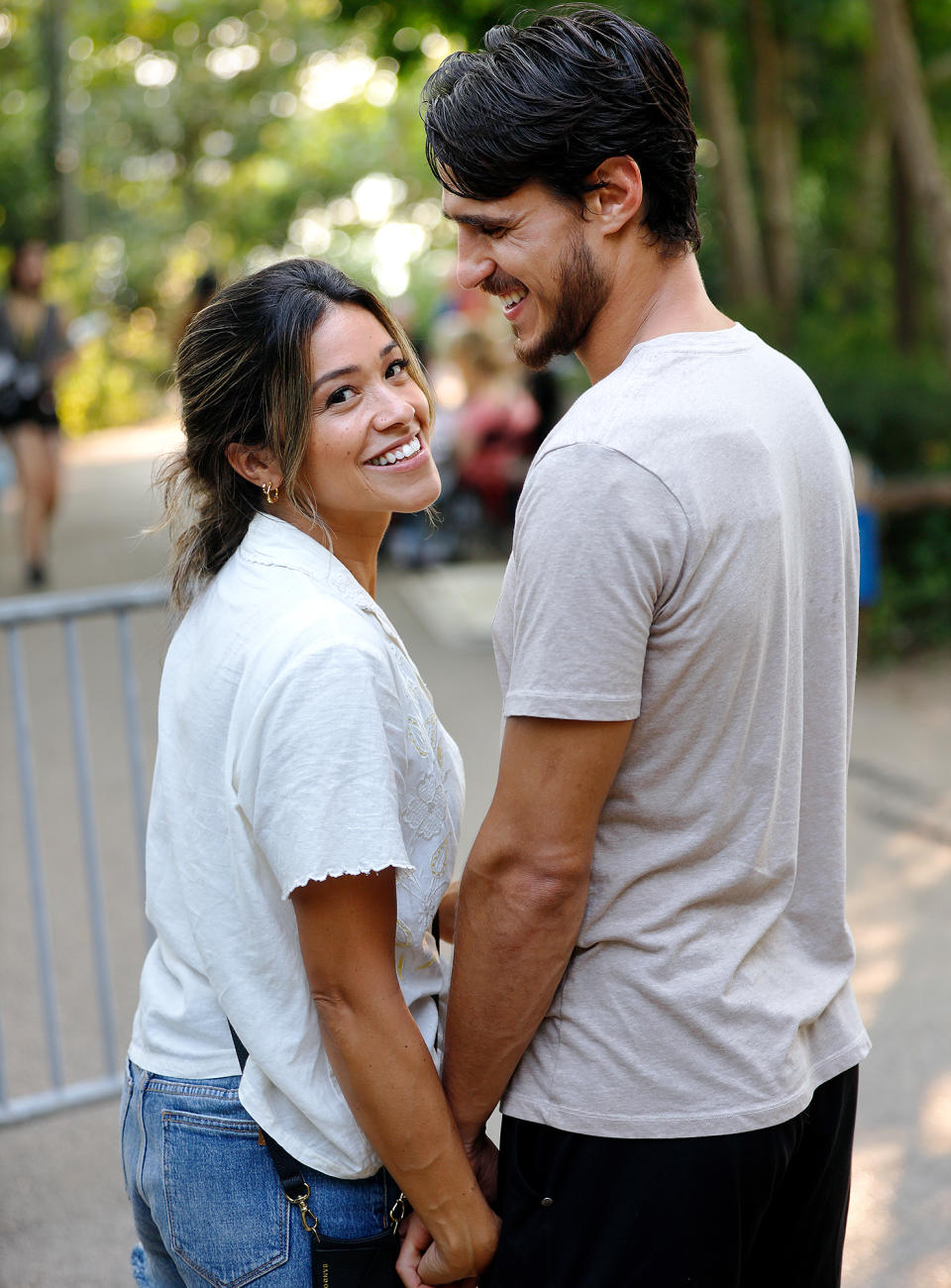 <p>Gina Rodriguez shares a sweet moment with husband Joe Locicero on the set of her new movie <em>Players</em> on July 28 in N.Y.C.</p>