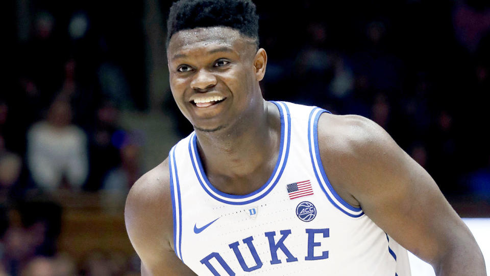 Duke’s Zion Williamson flashes a grin after his team made a play against North Carolina State. (AP Photo/Chris Seward)