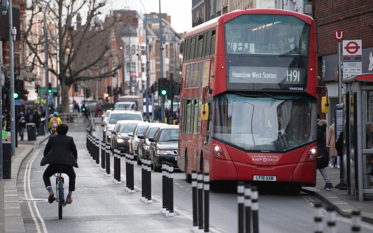 The Safer Cycle Pathway in King Street, Hammersmith is designed to improve road safety - Eddie Mulholland for The Telegraph