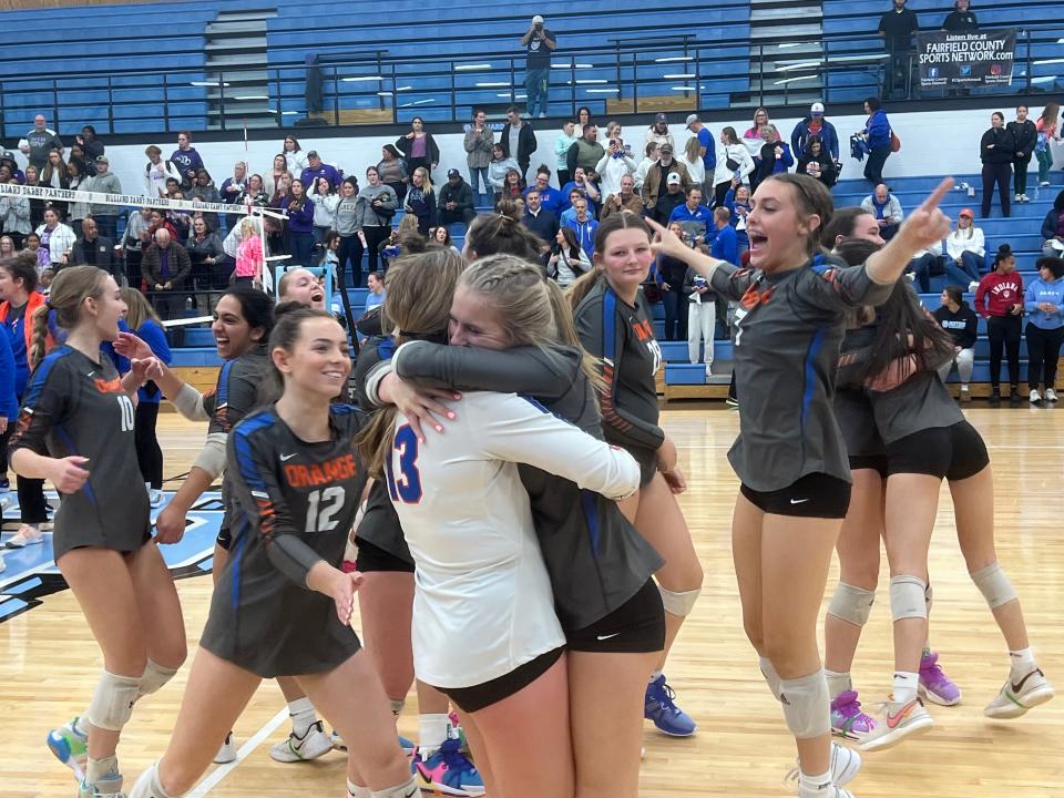 Olentangy Orange celebrates its Division I regional semifinal win Thursday night.