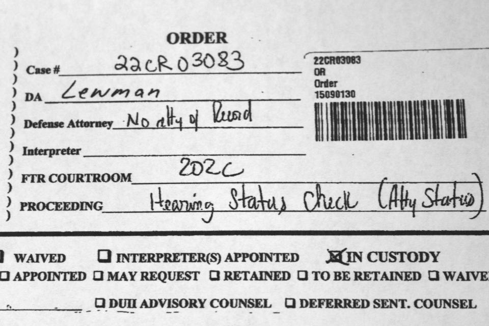 Courtroom notes showing that a Washington County, Oregon judge threatened to hold Oregon Public Defense Services in contempt of court for not providing a public defender to a criminal defendant are seen in this May 4, 2022, photo. The defendant in this case is charged with rape, sodomy and other sexual crimes and was finally assigned a public defender this week after weeks without one, prompting the judge's action. A post-pandemic glut of delayed cases has exposed shocking constitutional landmines impacting defendants and crime victims alike in Oregon, where an acute shortage of public defenders has even led judges to dismiss serious cases. (AP Photo/Gillian Flaccus)