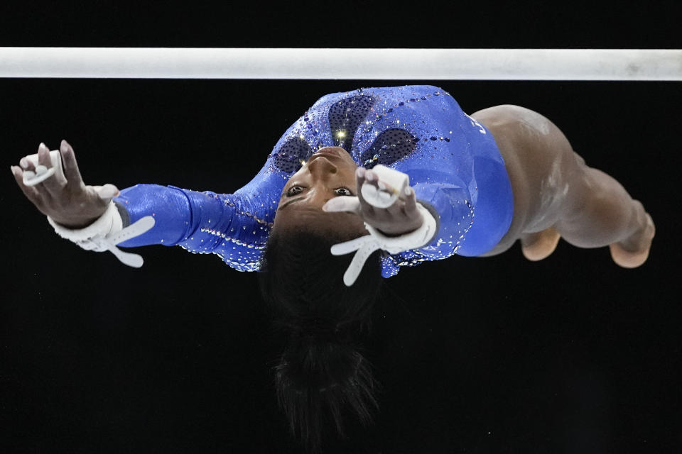 United States' Simone Biles competes in the uneven bars during the women's all-round final at the Artistic Gymnastics World Championships in Antwerp, Belgium, Friday, Oct. 6, 2023. (AP Photo/Virginia Mayo)