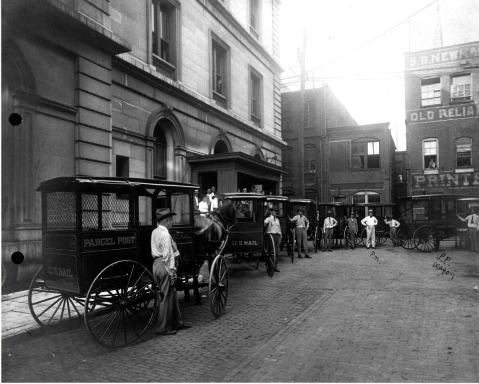 Horse and wagons deliver mail in Knoxville, Tennessee in 1913 vintage