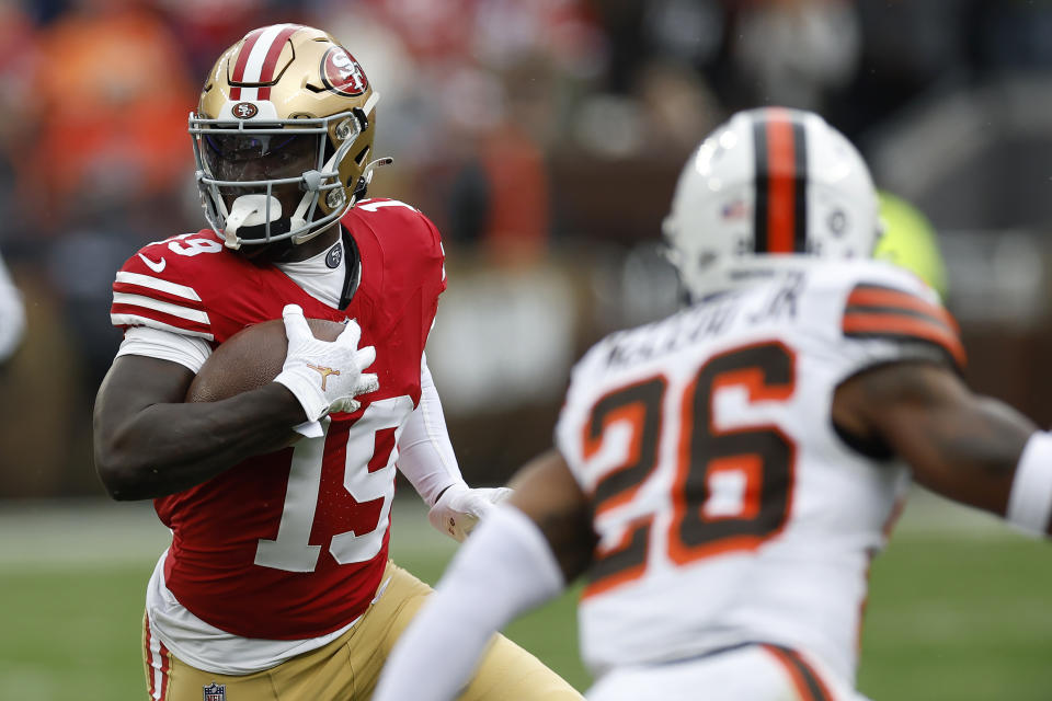 San Francisco 49ers wide receiver Deebo Samuel (19) runs against Cleveland Browns safety Rodney McLeod Jr. (26) during the first half of an NFL football game Sunday, Oct. 15, 2023, in Cleveland. (AP Photo/Ron Schwane)
