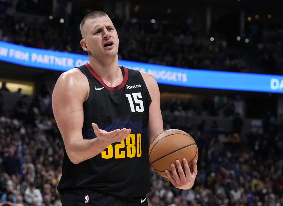 Denver Nuggets center Nikola Jokic reacts after a call during the second half in Game 2 of an NBA basketball first-round playoff series against the Los Angeles Lakers, Monday, April 22, 2024, in Denver. (AP Photo/Jack Dempsey)