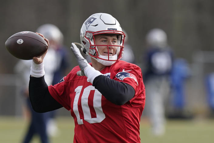 New England Patriots quarterback Mac Jones (10) throws a pass during an NFL football practice, Wednesday, Dec.15, 2021, in Foxborough, Mass. (AP Photo/Steven Senne)