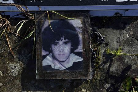 A memorial for Brian McKinney is seen at the site where his body was discovered in 1999 at Colgagh bog, Inniskeen, November 4, 2014. McKinney disappeared on the May 25, 1978, aged 22. REUTERS/Cathal McNaughton