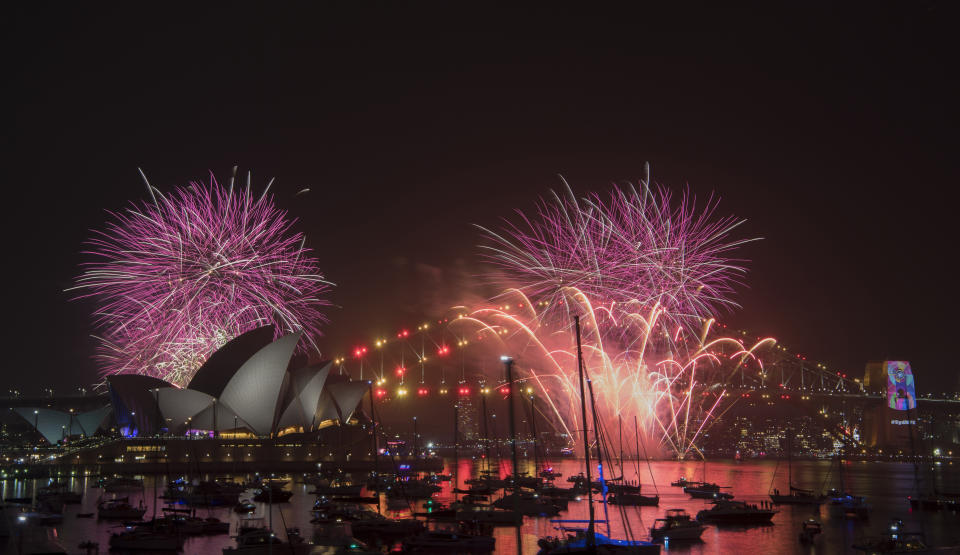 Fireworks explode over the Sydney Harbour during the New Year's Eve celebrations in Sydney