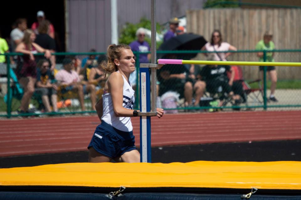 Hillsdale Academy senior Anna Roberts competes in the high jump event.