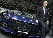 Daimler CEO Dieter Zetsche poses prior to the annual shareholder meeting of the car manufacturer Daimler in Berlin, Germany, Wednesday, May 22, 2019. (AP Photo/Michael Sohn)