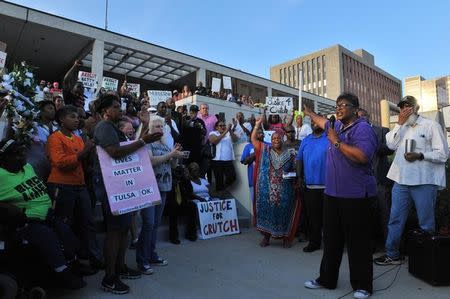 Pastor Jennettie Marshall speaks to protesters calling for the arrest of Officer Betty Shelby, who shot dead unarmed motorist Terence Crutcher, outside the Tulsa Police headquarters in Tulsa, Oklahoma, U.S. September 20, 2016. REUTERS/Nick Oxford
