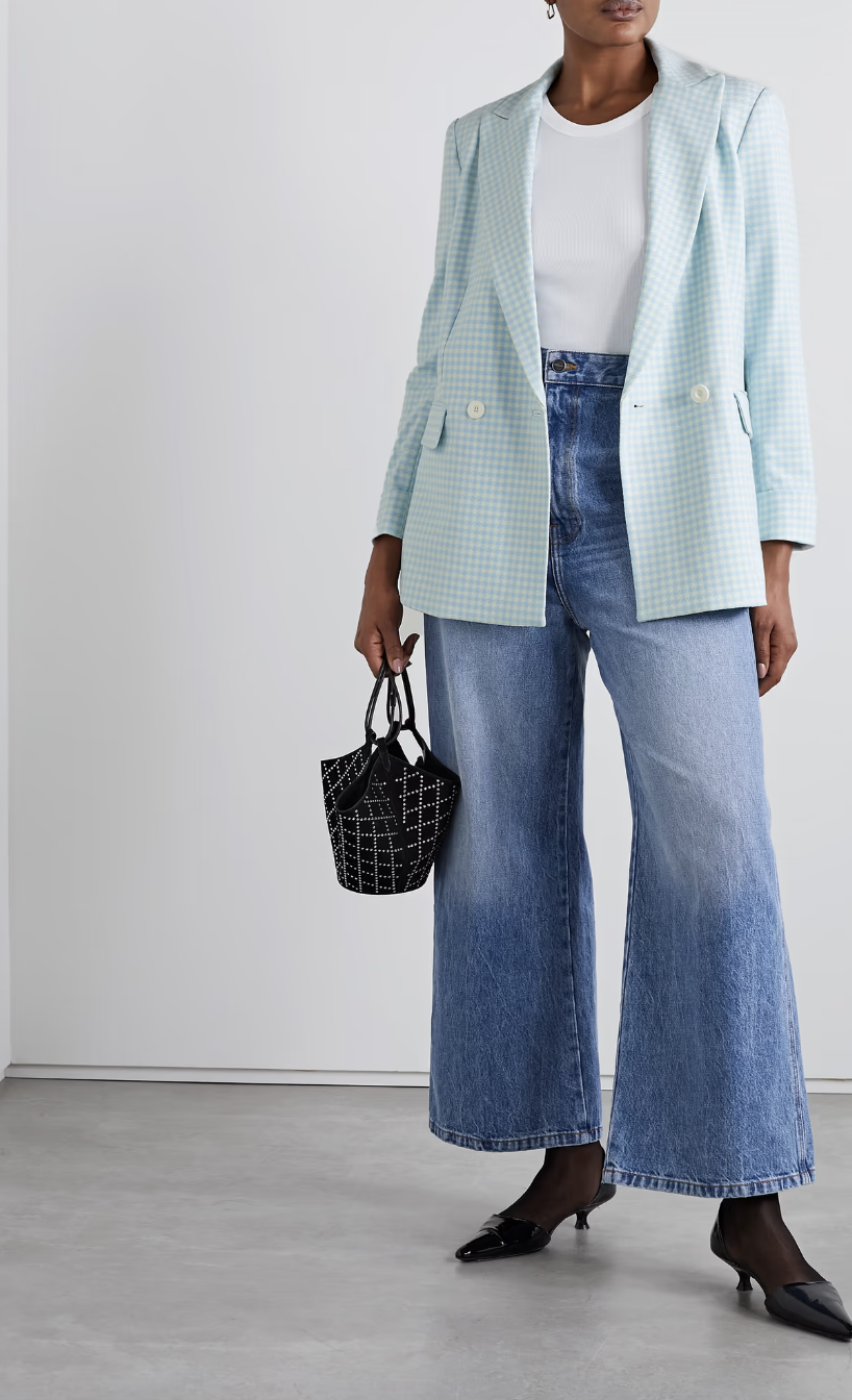 model wearing blue jeans, white t-shirt, blue and white Alice + Olivia Justin Gingham Woven Double-Breasted Blazer (Photo via Net-A-Porter)