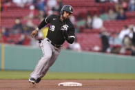 Chicago White Sox's Leury Garcia advances to third base on a double hit by Andrew Vaughn in the sixth inning of a baseball game against the Boston Red Sox, Sunday, April 18, 2021, in Boston. The game is the second of a doubleheader Sunday. (AP Photo/Steven Senne)