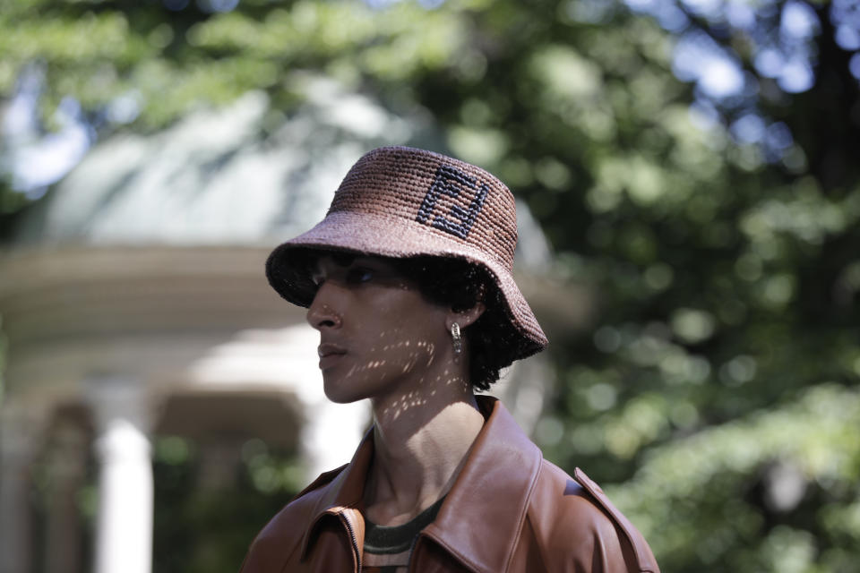 A model wears a creation as part of the Fendi men's Spring-Summer 2020 collection, unveiled during the fashion week, in Milan, Italy, Monday, June 17, 2019. (AP Photo/Luca Bruno)