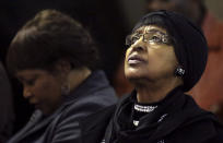 <p>Winnie Madikizela-Mandela, right, ex-wife of former South African President Nelson Mandela, and her daughter Zindzi attend a prayer service for the ailing Mandela at a church in Johannesburg, July 5, 2013. (Photo: Siphiwe Sibeko/Reuters) </p>