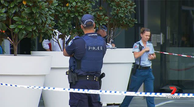 Police on scene after a man fell from the Q1 building on the Gold Coast. Source: 7News