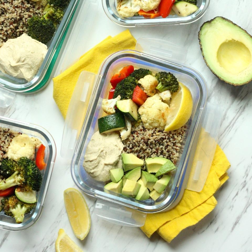 <p>Brimming with colorful roasted vegetables, these plant-based meal-prep lunch bowls are high in fiber to keep you full through the afternoon. The easy roasted veggies are based on a popular recipe from our sister magazine (see Associated Recipes). Feel free to use your favorite store-bought hummus to cut down on prep time, or make a batch of your own (see Tip). You can also sub in an 8-ounce microwaveable quinoa pouch to minimize cooking. <a href="https://www.eatingwell.com/recipe/277634/lemon-roasted-vegetable-hummus-bowls/" rel="nofollow noopener" target="_blank" data-ylk="slk:View Recipe;elm:context_link;itc:0;sec:content-canvas" class="link ">View Recipe</a></p>