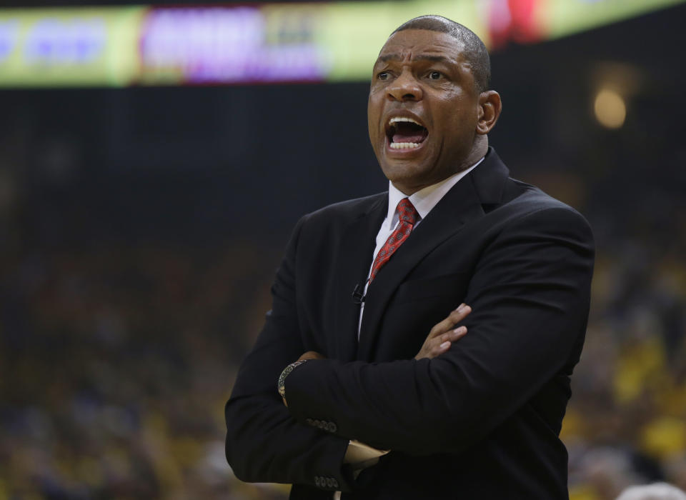 Los Angeles Clippers coach Doc Rivers yells out instructions as his team plays the Golden State Warriors during the first half in Game 3 of an opening-round NBA basketball playoff series, Thursday, April 24, 2014, in Oakland, Calif. (AP Photo/Marcio Jose Sanchez)