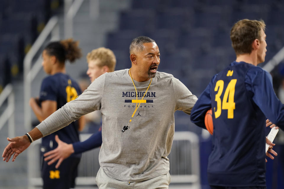 Michigan head basketball coach Juwan Howard instructs his NCAA college team during a practice, Friday, Oct. 14, 2022, in Ann Arbor, Mich. (AP Photo/Carlos Osorio)