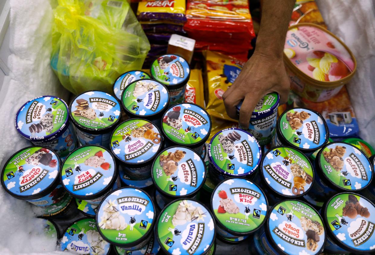 A man buys Ben & Jerry's ice cream in Jerusalem on July 20, 2021. - Ice cream-maker Ben & Jerry's announced they would stop selling their ice cream in the occupied Palestinian territories.