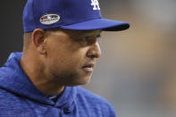 Los Angeles Dodgers manager Dave Roberts watches his players during baseball practice Wednesday, Oct. 3, 2018, in Los Angeles for Thursday's Game 1 of the team's National League Division Series against the Atlanta Braves. (AP Photo/Jae C. Hong)