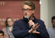 FILE - MSNBC television anchor Joe Scarborough, co-hosts of the show "Morning Joe," takes questions from an audience, Wednesday, Oct. 11, 2017, at a forum called, "Harvard Students Speak Up: A Town Hall on Politics and Public Service," on the campus of Harvard University, in Cambridge, Mass. In the past few weeks, NBC reversed a decision to hire former Republican National Committee head Ronna McDaniel as a political contributor following a revolt by some of its best-known personalities, including Scarborough, Rachel Maddow, and others. (AP Photo/Steven Senne, File)
