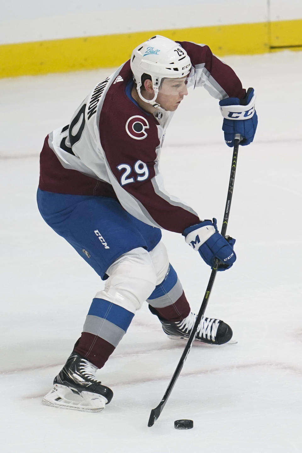 CORRECTS TO NATHAN MACKINNON, INSTEAD OF GREG PATERYN - Colorado Avalanche forward Nathan MacKinnon shoots and scores during the first period of the team's NHL hockey game against the Los Angeles Kings on Thursday, Jan. 21, 2021, in Los Angeles. (AP Photo/Ashley Landis)