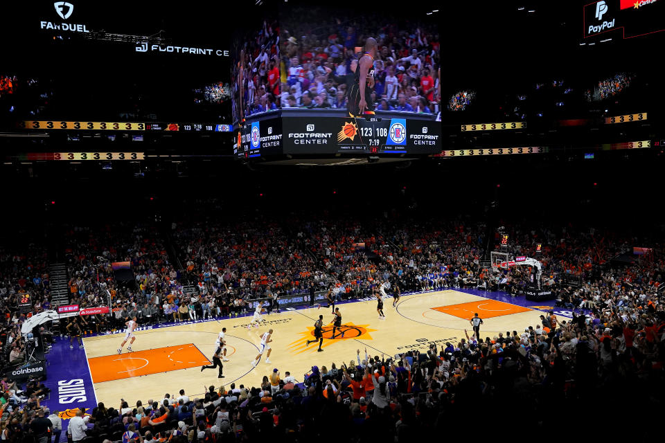 The Los Angeles Clippers and the Phoenix Suns compete during the second half of Game 5 of a first-round NBA basketball playoff series, Tuesday, April 25, 2023, in Phoenix. (AP Photo/Matt York)