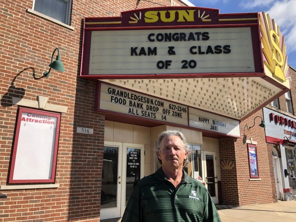 Chuck Pantera in front of the Sun Theatre in downtown Grand Ledge Monday, July 13, 2020. Opened in 1931, it's one of three remaining small historical movie theaters in Greater Lansing. It's been closed since March 2020.