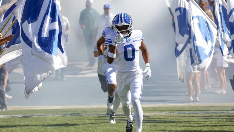 BYU’s Kody Epps runs onto the field before playing the Arkansas Razorbacks in Provo on Saturday, Oct. 15, 2022.