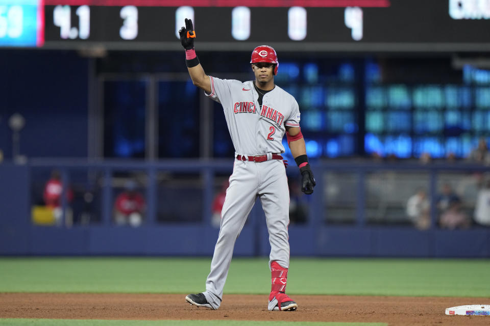 Cincinnati Reds' Jose Barrero celebrates after hitting a double during the fifth inning of a baseball game against the Miami Marlins, Saturday, May 13, 2023, in Miami. (AP Photo/Wilfredo Lee)