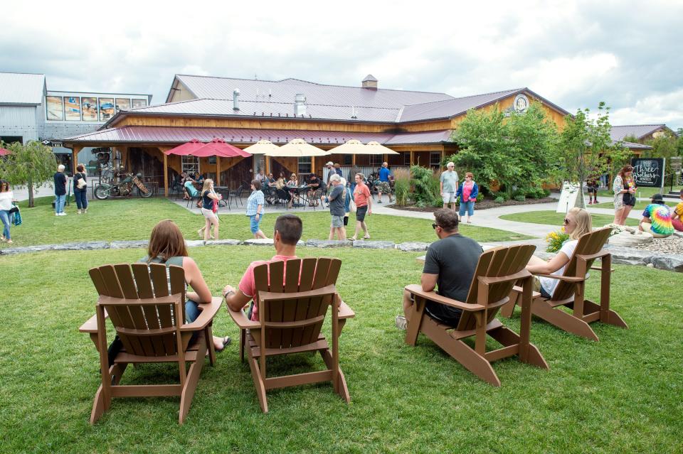 From left, Angela and Kevin Cloutier of Pittsburgh and Ryan Hill and Shannon McConnell, both of Altoona, Pennsylvania, lounge outdoors at Three Brothers Wineries and Estates in 2017.