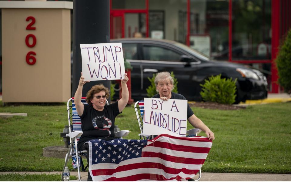 Supporters repeated Mr Trump's false claim that he won the election outside the Greenville Convention Center  - Tasos Katopodis/UPI/Shutterstock