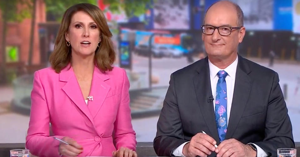 Natalie Barr in a pink blazer and David 'Kochie' Koch on the set of sunrise