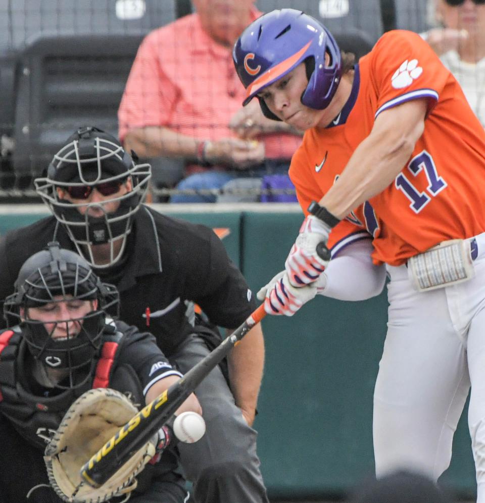 Clemson sophomore Billy Amick (17) bats against Louisville during the bottom of the fourth inning at Doug Kingsmore Stadium in Clemson Friday, May 5, 2023. 