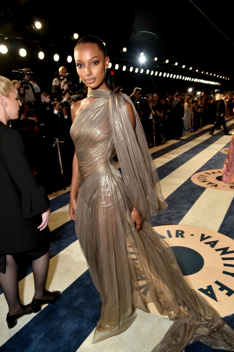 <p>WHO: Jasmine Tookes</p> <p>WHAT: Jean-Louis Sabaji, John Hardy jewelry</p> <p>WHERE: At the <em>Vanity Fair</em> Oscars party, Los Angeles</p> <p>WHEN: March 4, 2018</p>