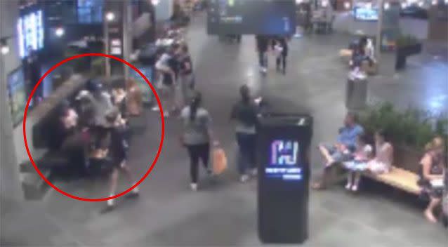 People in the busy food court watch the assault unfold but do nothing to help the two young victims. Picture: Victoria Police