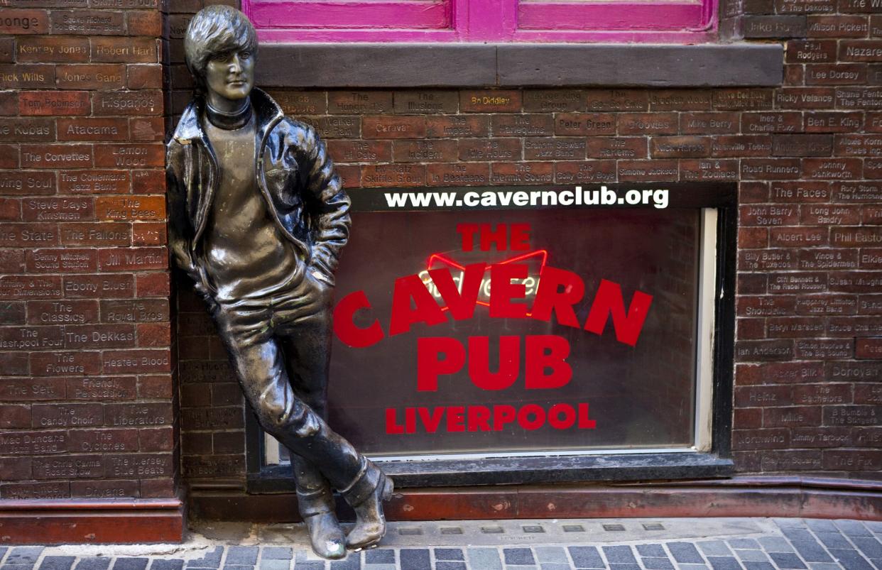 A statue of John Lennon situated outside the historic cavern Club in Liverpool