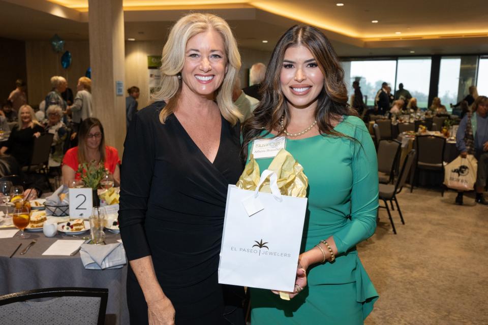 Dr. Athena Brasfield (with Karen Devine, KESQ News Channel 3 anchor) won the El Paseo Jewelers $20,000 raffle package at Olive Crest's annual Power of One luncheon, Feb. 1, 2024.