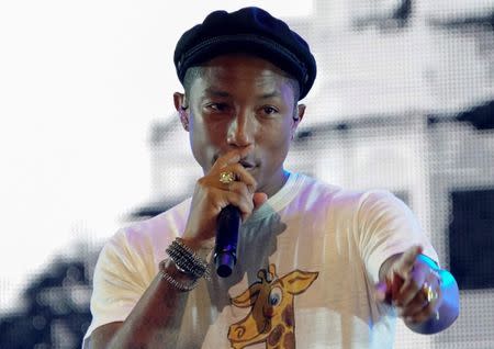 Formula One - F1 - Singapore Grand Prix 2015 - Marina Bay Street Circuit, Singapore - 18/9/15 Pharrell Williams performs on the Padang Stage in Zone 4 SGP2015 Mandatory Credit: Singapore Grand Prix / Action Images via Reuters Livepic