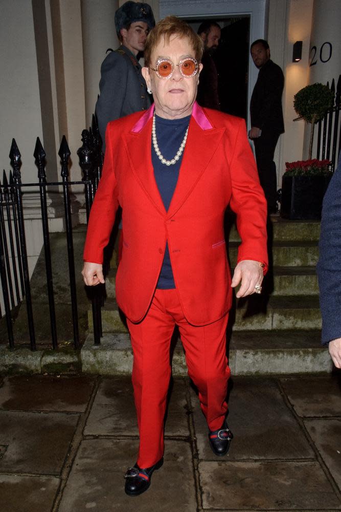 Elton John leaving Evgeny Lebedev’s party in December 2017