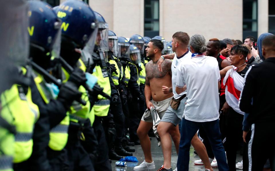 England fans and police outside Wembley. - REUTERS