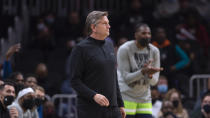 Minnesota Timberwolves coach Chris Finch watches during the first half of the team's NBA basketball game against the Atlanta Hawks on Wednesday, Jan. 19, 2022, in Atlanta. (AP Photo/Hakim Wright Sr.)