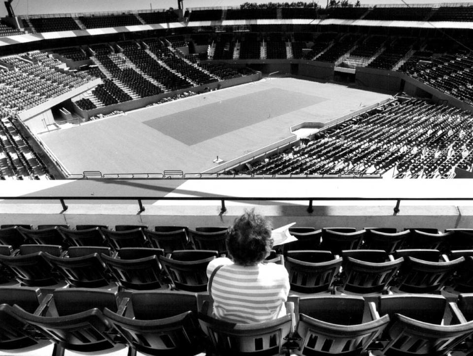 Estelle Abelson of Ottawa, Canada, checks out the view from seats near the top of the Tennis Center at Crandon Park, during Select- A - Seat Day for the Lipton Championships in 1994.
