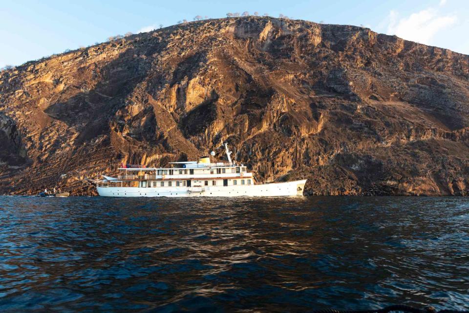 <p>Courtesy of Quasar Expeditions</p> The 16-passenger Grace sails through the Galápagos Islands.