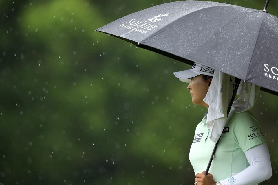 Jin Young Ko waits to putt on the 17th hole during the first round of The Chevron Championship golf tournament Thursday, April 20, 2023, in The Woodlands, Texas. (AP Photo/David J. Phillip)